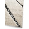 Tapis design chambre crème Divide