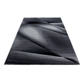 Tapis moderne effet courbe à courtes mèches Kyzac