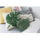 Coussin lavable en machine beige Monstera Lorena Canals