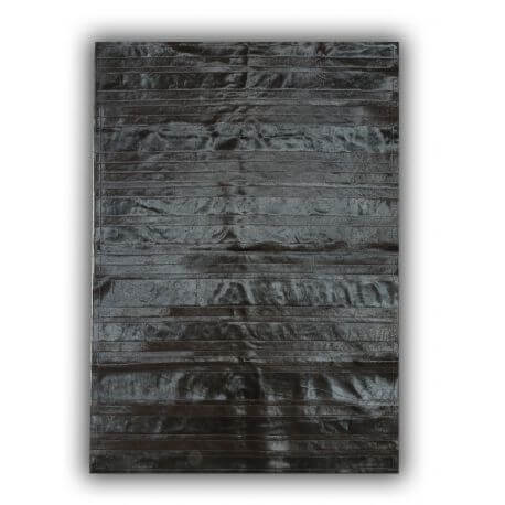 Tapis noir en peau de vache plat naturel intérieur Clara